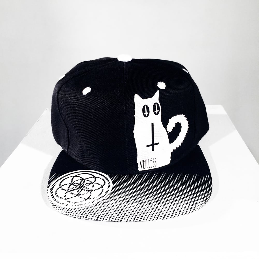 Image of Lucipurr Hat with Black and White Polka Dot Bill