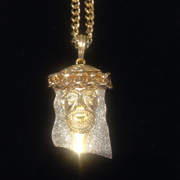Image of Shiny Jesus piece on Cuban Chain