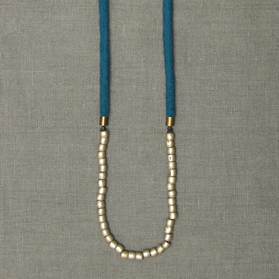 Image of necklace no. 14<br><br>teal cord with late 19th C silver beads