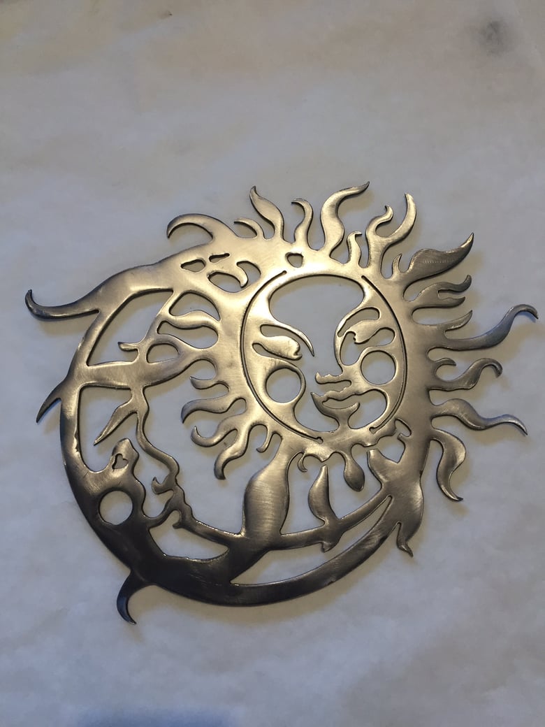 Image of Sun and Moon Face metal wall art