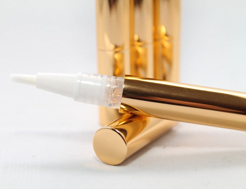 Image of teeth whitening pen/ gold