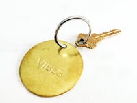 Image 3 of VIBES Large Brass Keychain