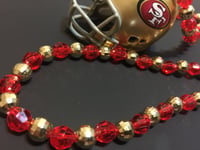 Image 2 of Red & Gold Beads with 49er Helmet