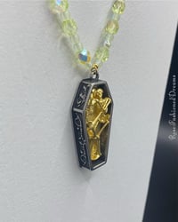 Image of Lovers Coffin Yellow Uranium Glass Necklace