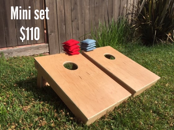 Image of The Mini Cornhole set 24" x 16" + 8 bags (4 red 4 sky blue)