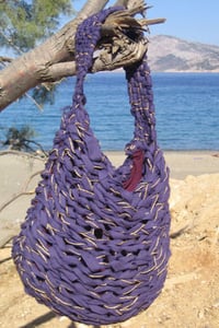 Image of small fabric knit bag