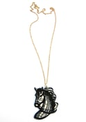 Image of black and white horse necklace