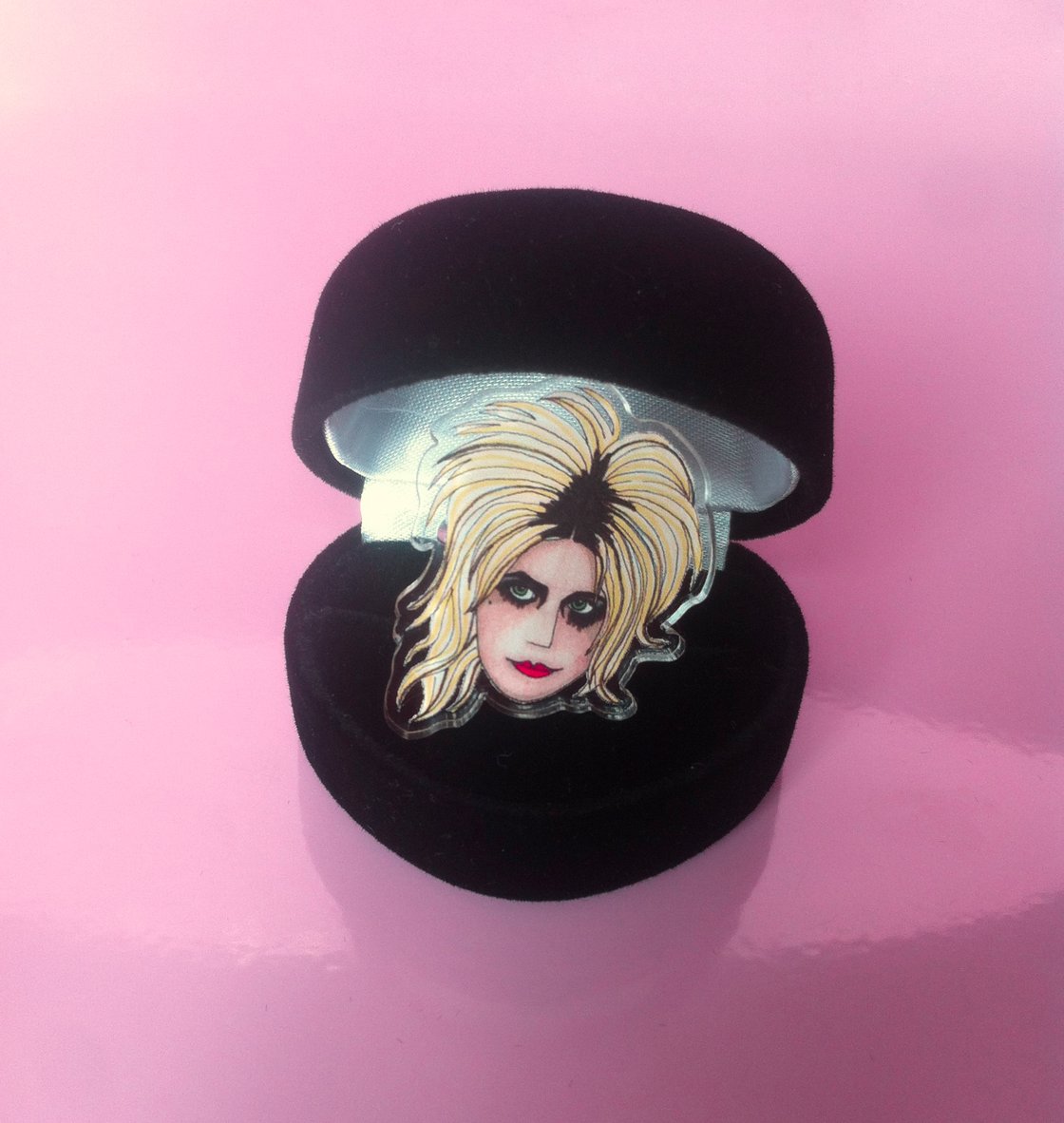 Image of Donita Spark L7 acrylic plastic adjustable ring sold in black heart shaped box.