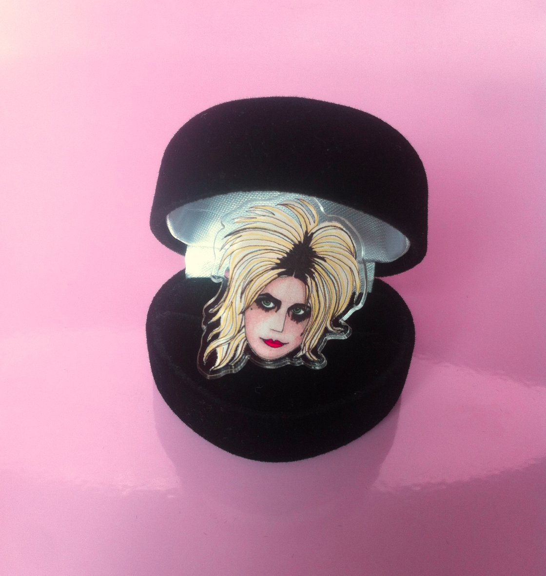 Image of Donita Spark L7 acrylic plastic adjustable ring sold in black heart shaped box. 