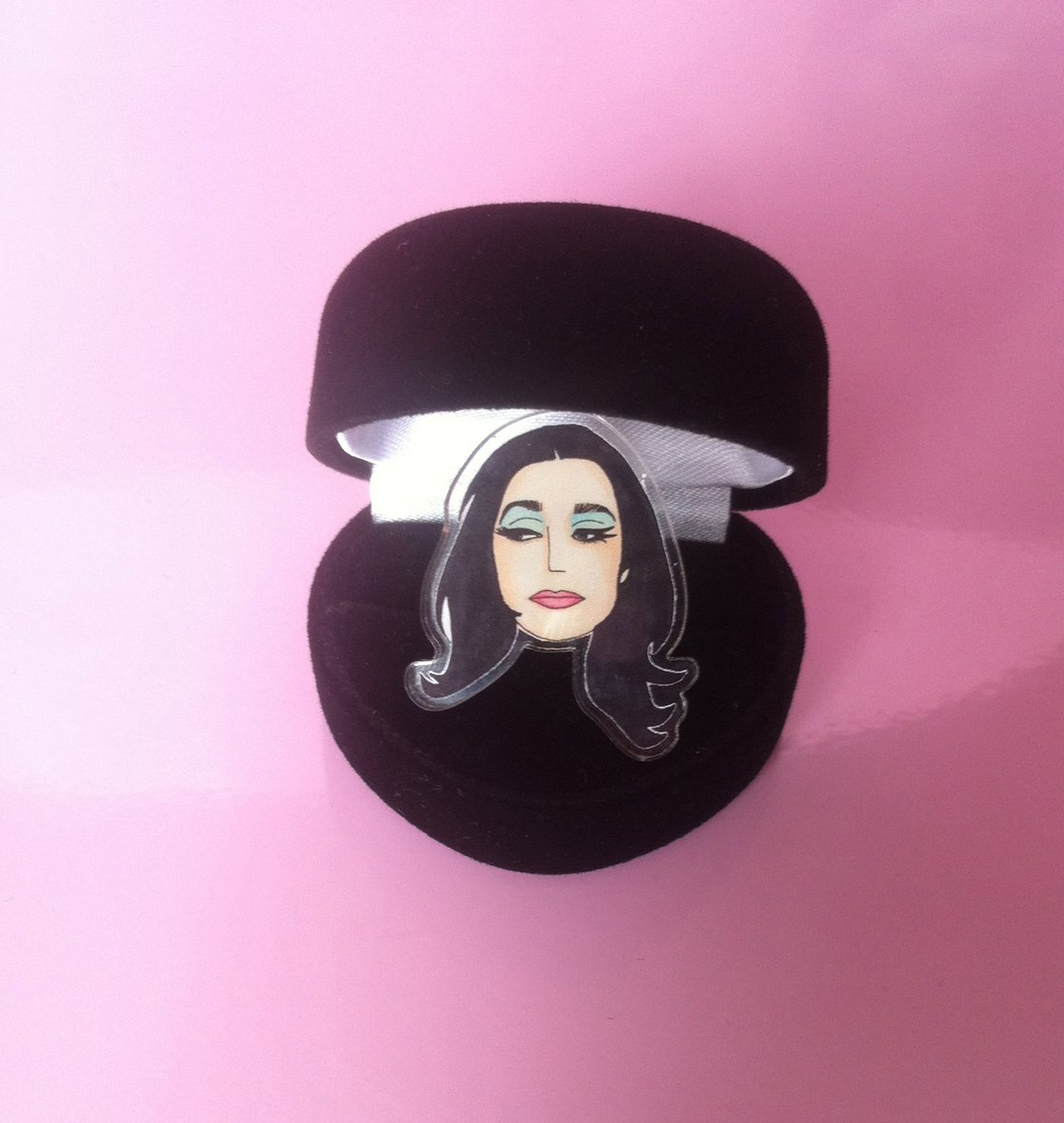 Image of Pj Harvey acrylic plastic adjustable ring sold in black heart shaped box. 