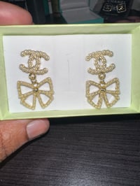 cc pearl bow earrings