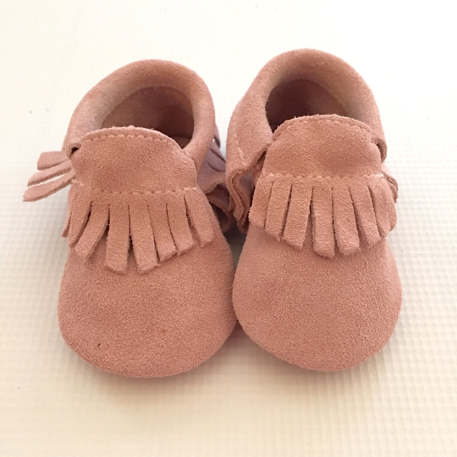 pink suede moccasins