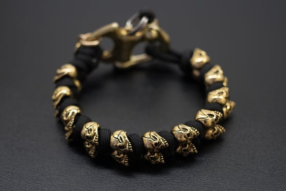 Image of Evil Twins 18K Gold Skull Bracelet