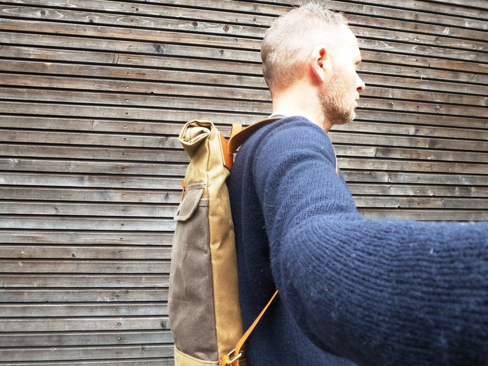 Image of Waxed canvas backpack with roll to close top and leather shoulderstrap and back reinforcement