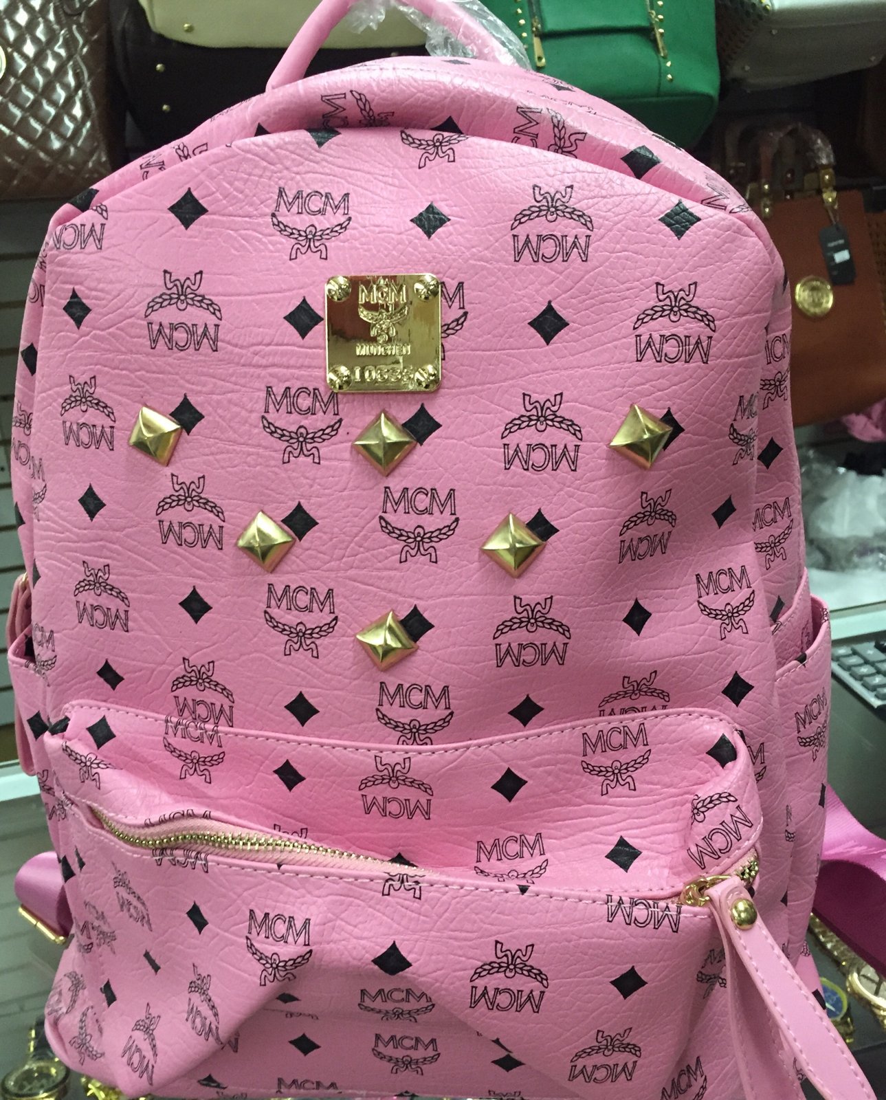 Dark pink discount mcm backpack