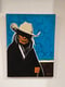 Image of Cowboy holding rope