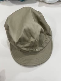 Tan cap