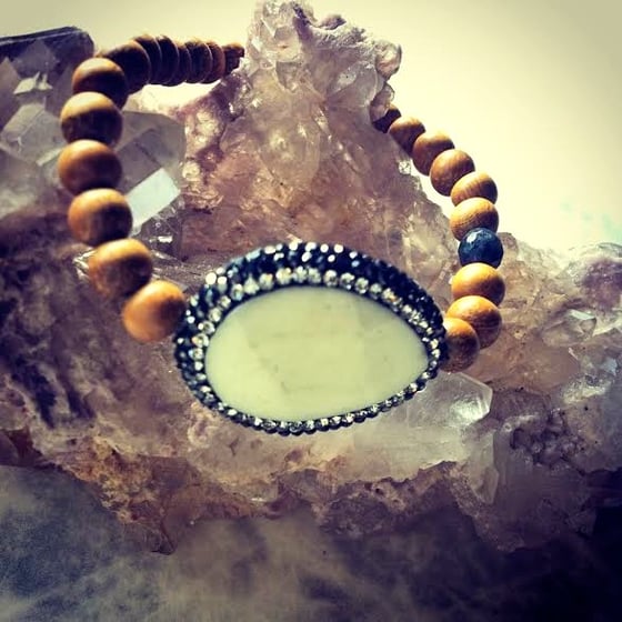 Image of Hematite Encrusted Sacred White Buffalo Turquoise and Sandalwood with Black Opal