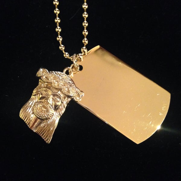 Image of Jesus piece and dog tag
