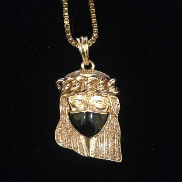 Image of Gold Jesus piece with black mask