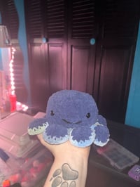Image 2 of Reversible Emotions Octopus Plushie