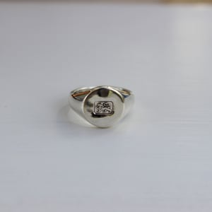 Image of men's signet ring with 'lion stamp'