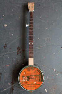 Image of McCormick Tea Tin Banjo