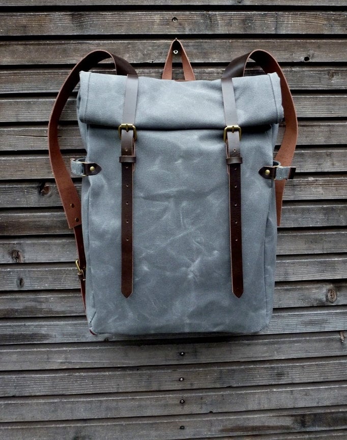 Image of Waxed canvas backpack with roll to close top and leather shoulder straps