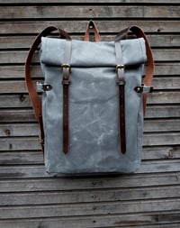 Image 1 of Waxed canvas backpack with roll to close top and leather shoulder straps
