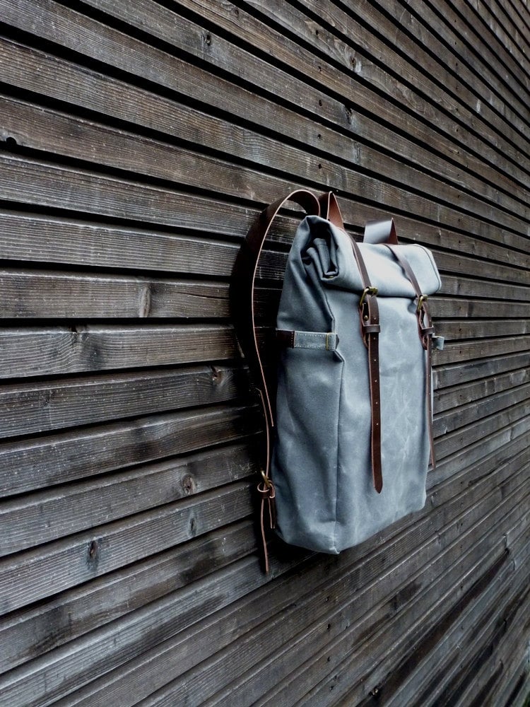 Image of Waxed canvas backpack with roll to close top and leather shoulder straps