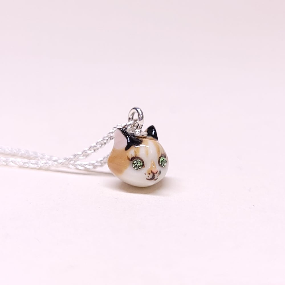 Image of Calico Porcelain & Sterling Silver Teeny Tiny Cat Pendant