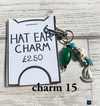 Image 15 of Ed’s hat ear charms