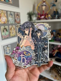 Image 7 of Cosmic Galaxy Saturn Enamel pin ( OG and purple chrome variant) 