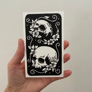 Human And Cat Skull Linocut Print