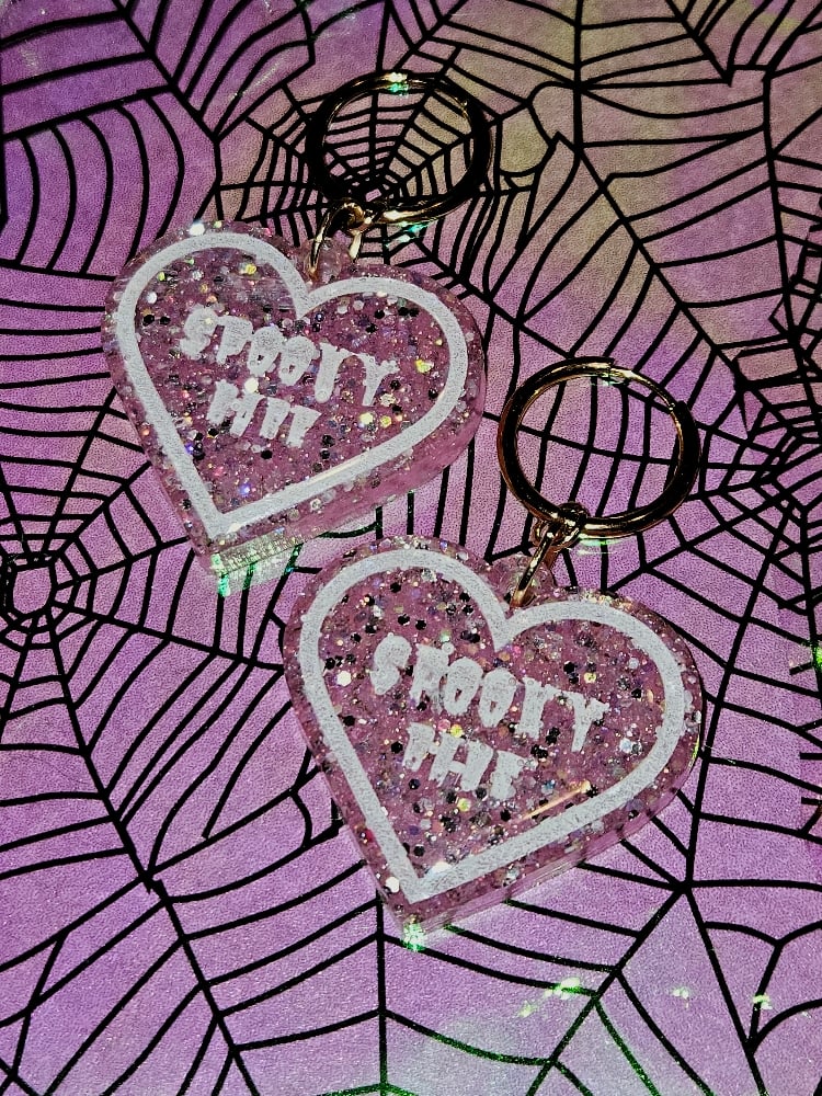 Image of Spooky Babe Heart Earrings: Baby Pink Sparkle with White Lettering