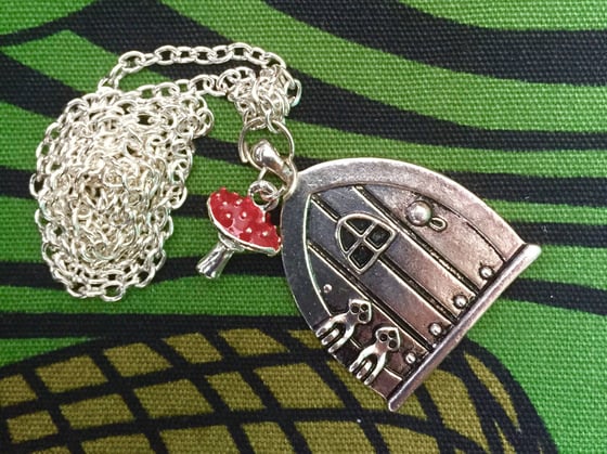 Image of Fairy door and toadstool silver plated pendant