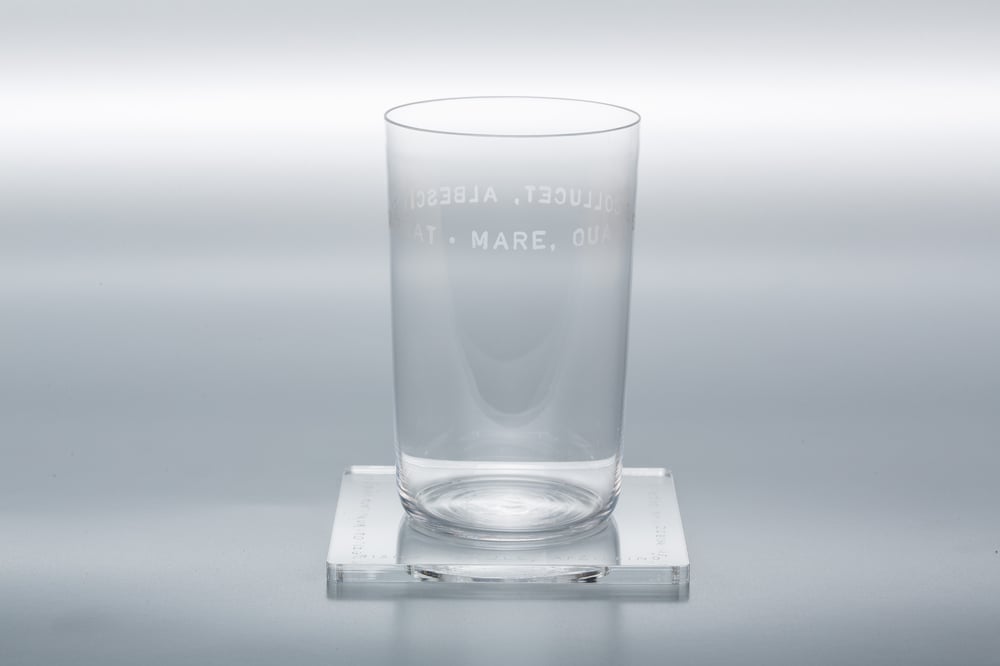 Image of VERBA water glass with a Latin inscription 