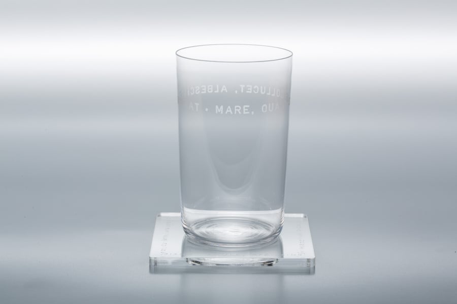 Image of VERBA water glass with a Latin inscription 