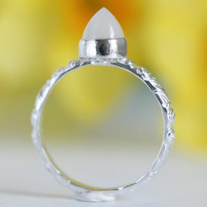 Image of Silver ring with moonstone bullet
