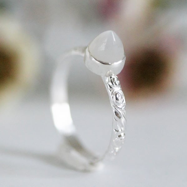 Image of Silver ring with moonstone bullet