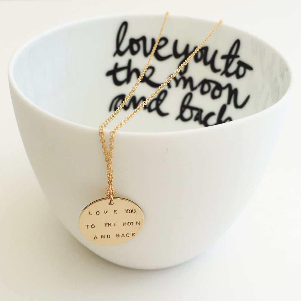 Image of Message on a necklace