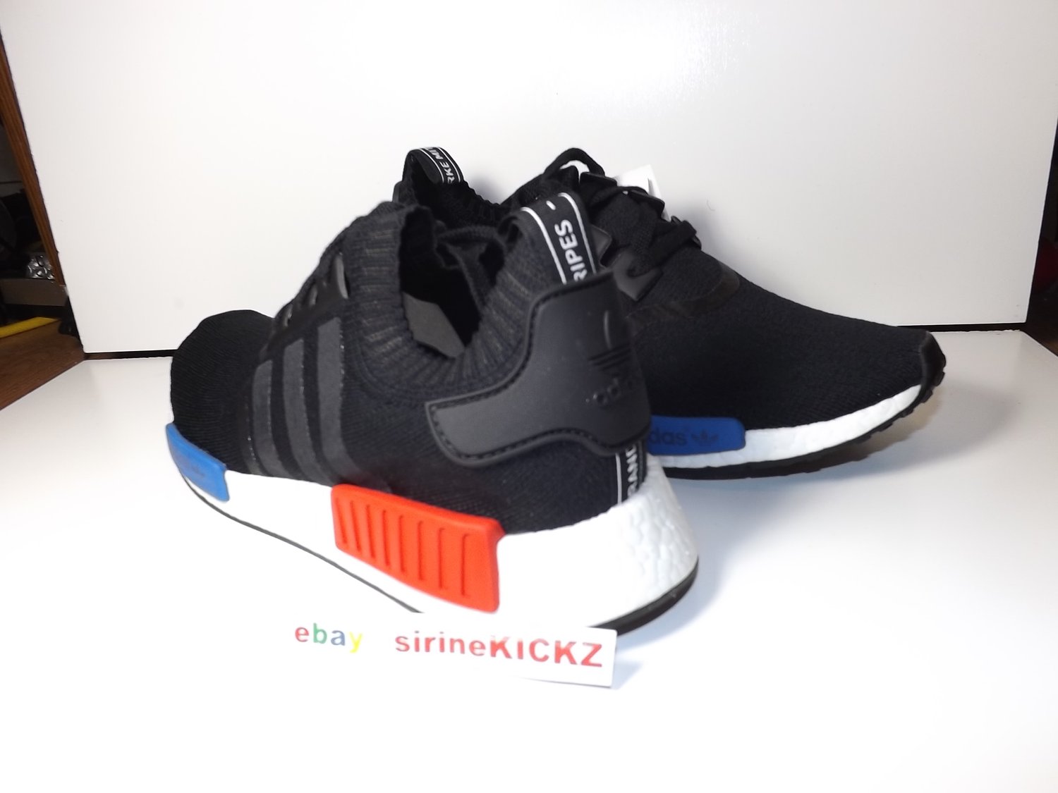 Image of Adidas NMD Nomad Runner Primeknit Boost Black Red Blue S79168 SIZE 7.5