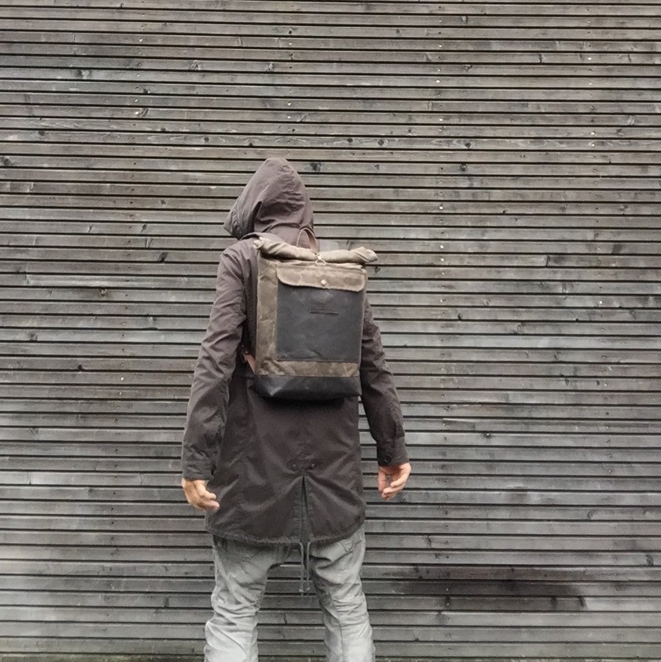 Brown waterproof backpack.