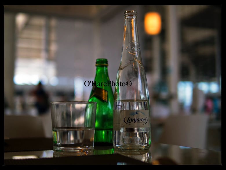 Image of BOTTLES & A GLASS