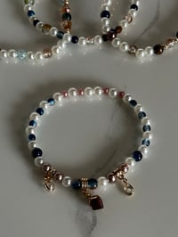 Image 7 of Starlight Shimmer Moon and Stars| Cream, Navy, and Gold  Tumbler Bracelet Stack