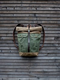 Image 1 of Waxed canvas backpack with roll to close top and vegetable tanned leather shoulder straps