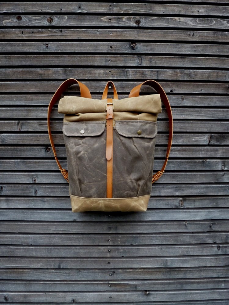 Image of Waxed canvas backpack with roll to close top and leather shoulderstrap and back reinforcement
