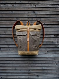 Image 1 of Waxed canvas backpack with roll to close top and leather shoulderstrap and back reinforcement