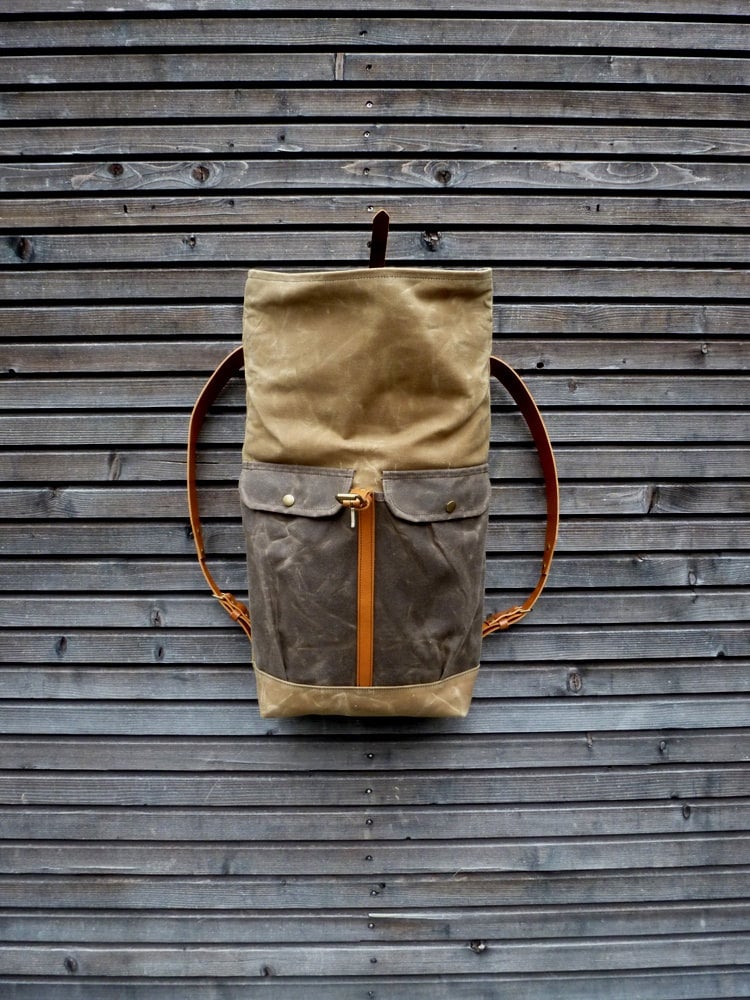 Image of Waxed canvas backpack with roll to close top and leather shoulderstrap and back reinforcement