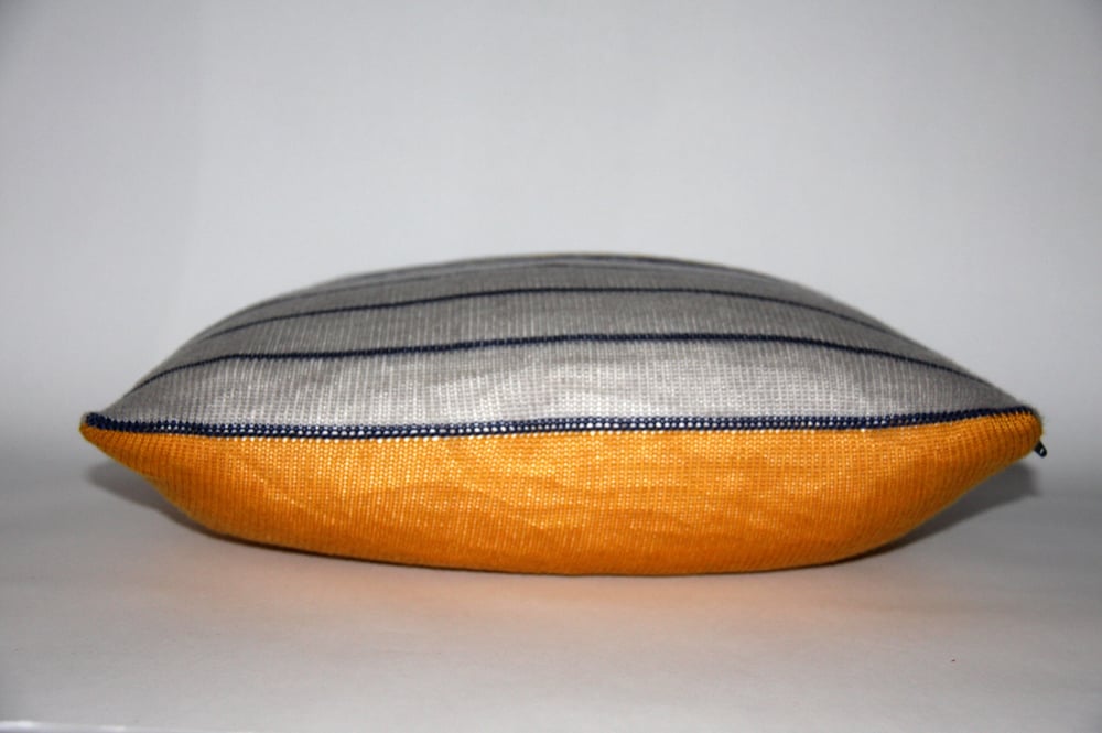 Image of Large yellow-backed knitted cushion